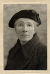 Photographed in outdoor coat and hat